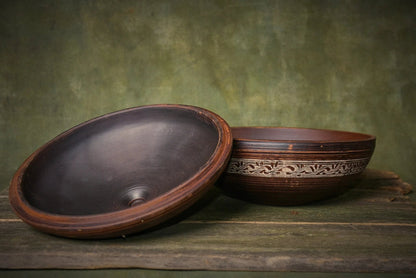 Handmade ceramic clay pot with lid, rustic artisan baking dish, decorative pattern