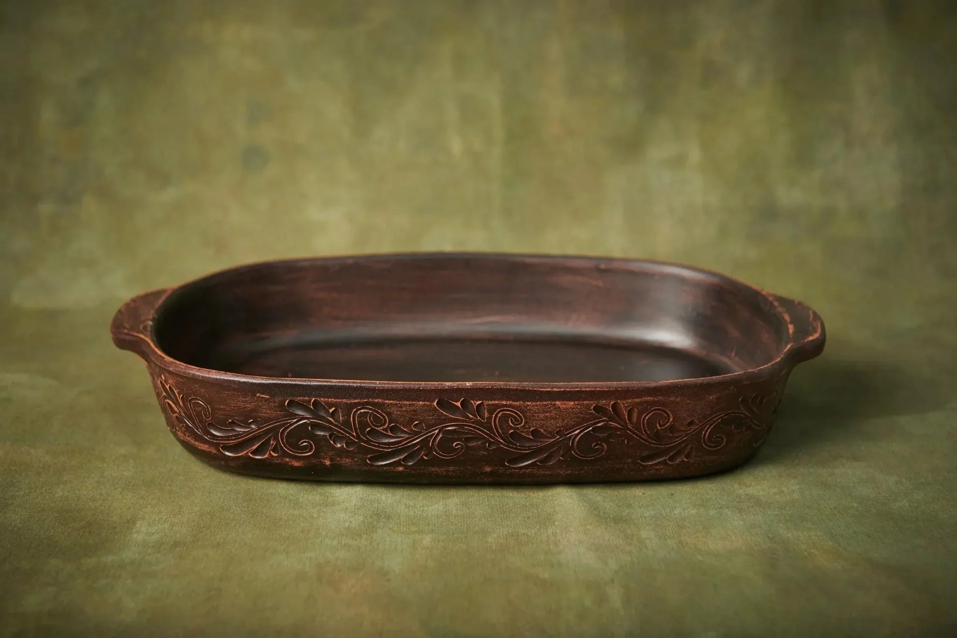 Handmade ceramic baking tray with decorative pattern, artisan pottery lasagna pan
