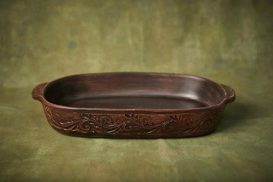 Handmade ceramic baking tray with decorative pattern, artisan pottery lasagna pan