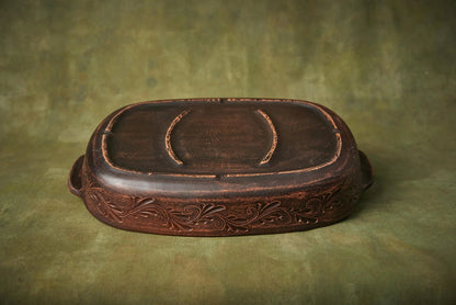 Handmade ceramic baking tray with ornate floral design, artisan pottery lasagna pan