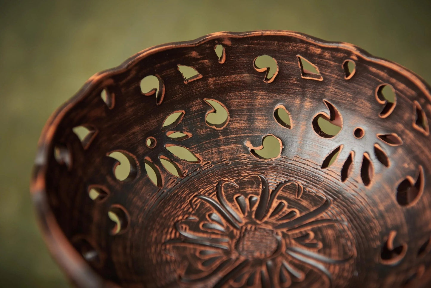 Handmade ceramic candy bowl with carved rustic floral design, clay home décor dish