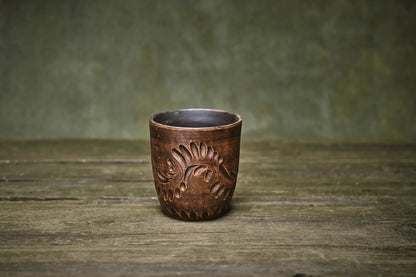 Handmade engraved clay tumbler cup on rustic wood, artisan homeware from clayproductsshop