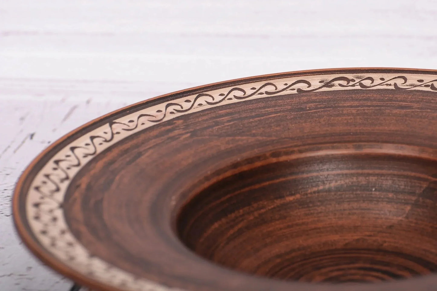 Handmade ceramic pasta bowl with decorative rim, rustic brown clay, artisan homeware