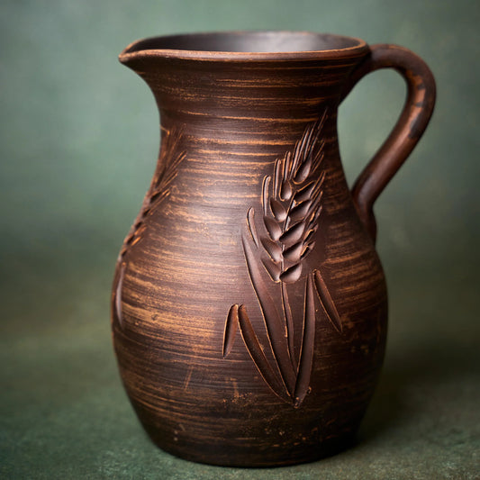 Handmade clay pitcher with wheat design, rustic homeware for kitchen decor