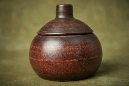 Handmade brown ceramic baking pot with lid, rustic clay cookware for kitchen decor