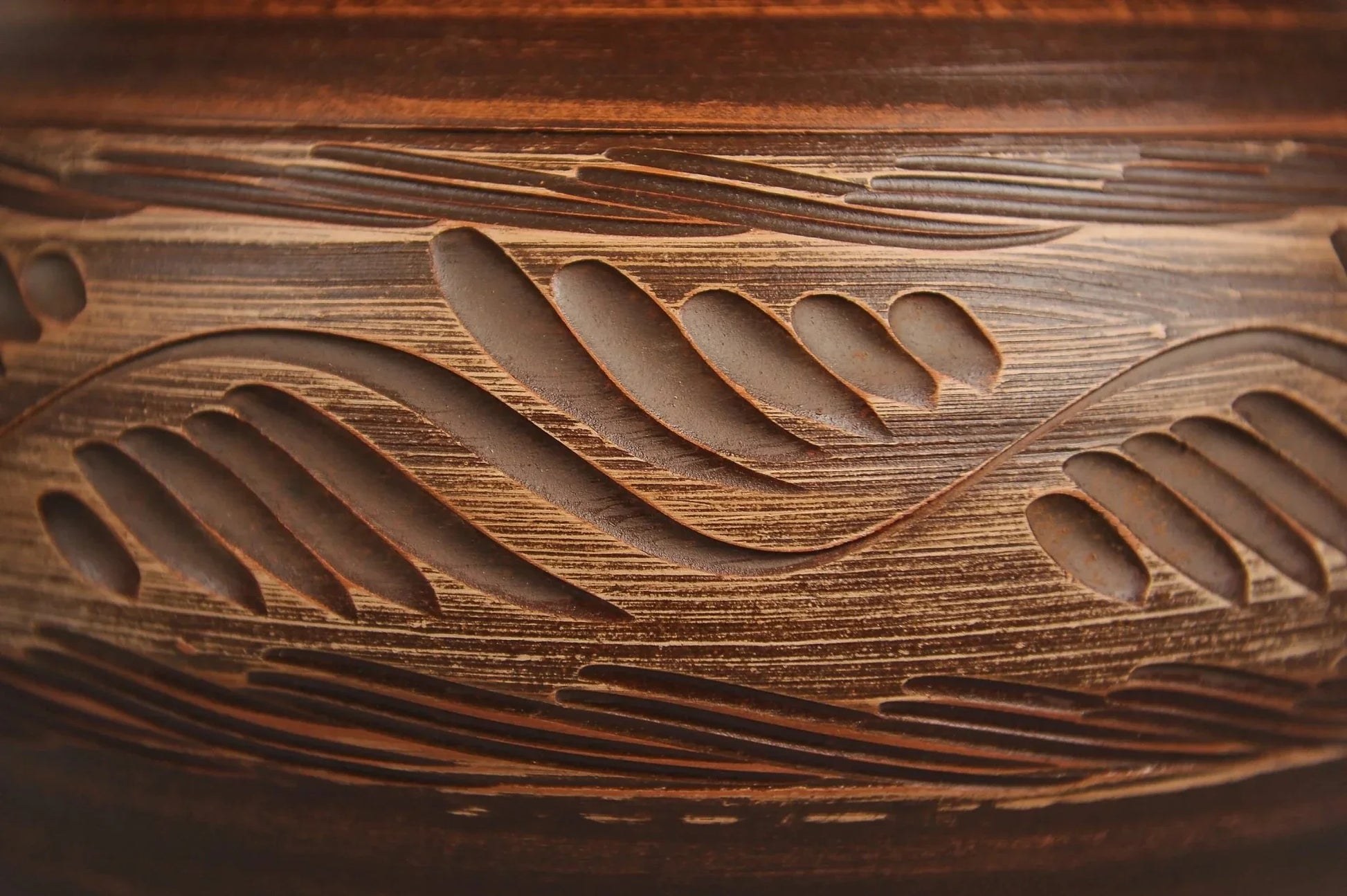 Handmade ceramic clay pot with carved organic leaf pattern, artisan homeware from clayproductsshop