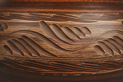 Handmade ceramic clay pot with carved organic leaf pattern, artisan homeware from clayproductsshop