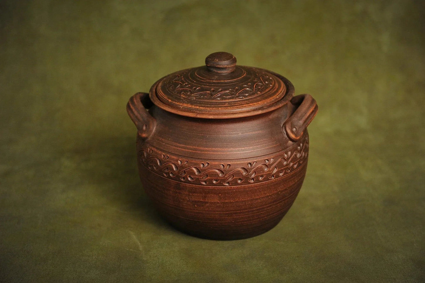 Handmade ceramic clay baking pot with lid and handles, artisan kitchen cookware