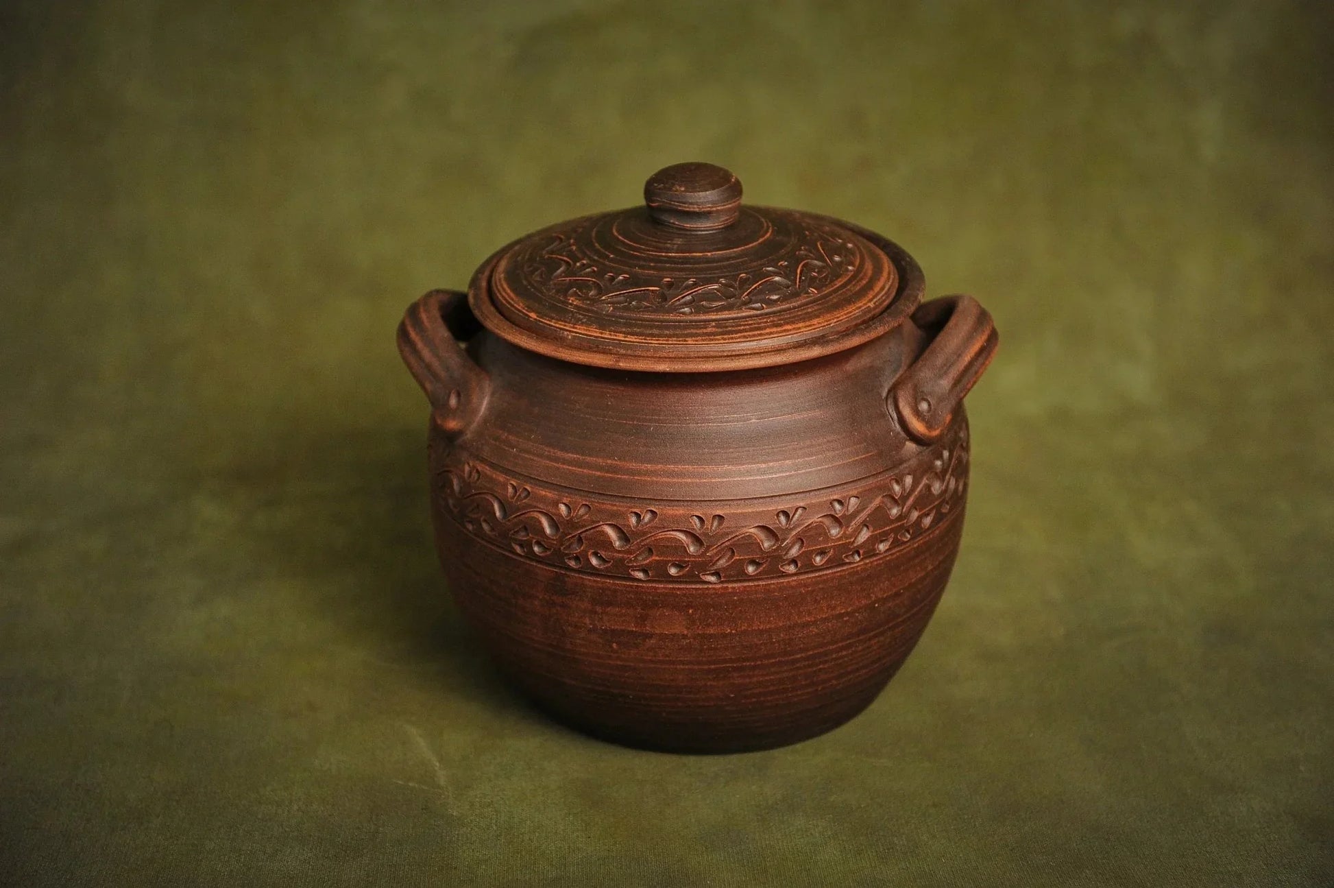 Handmade ceramic clay baking pot with lid and handles, artisan kitchen cookware