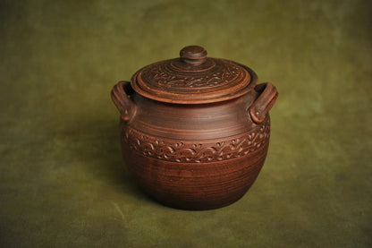 Handmade ceramic clay baking pot with lid and handles, artisan kitchen cookware