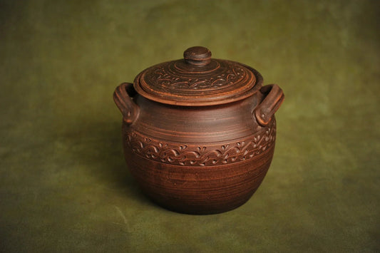 Handmade ceramic clay baking pot with lid and handles, artisan kitchen cookware