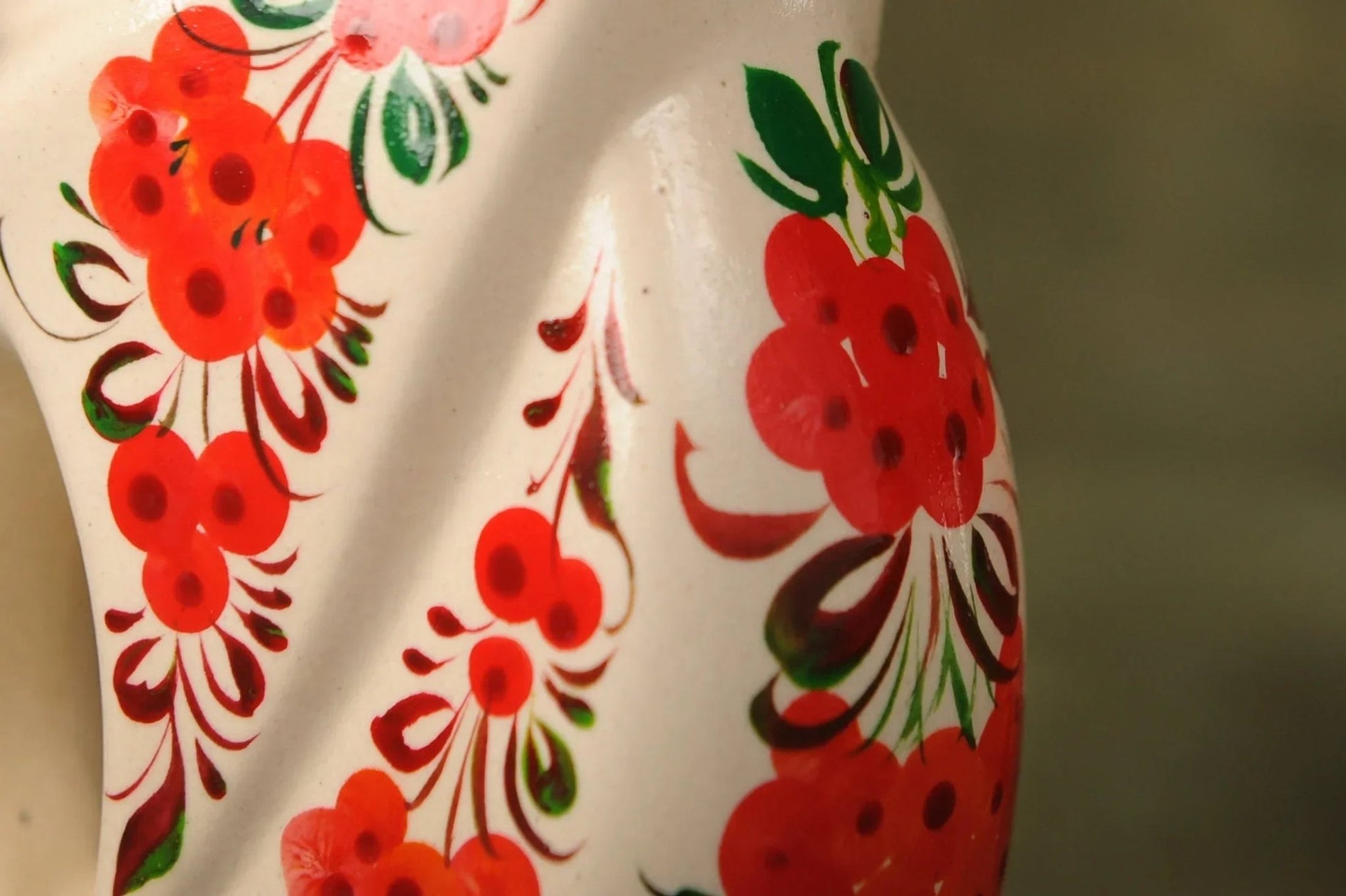 Handmade white ceramic vase with red floral design, artisan home decor bowl