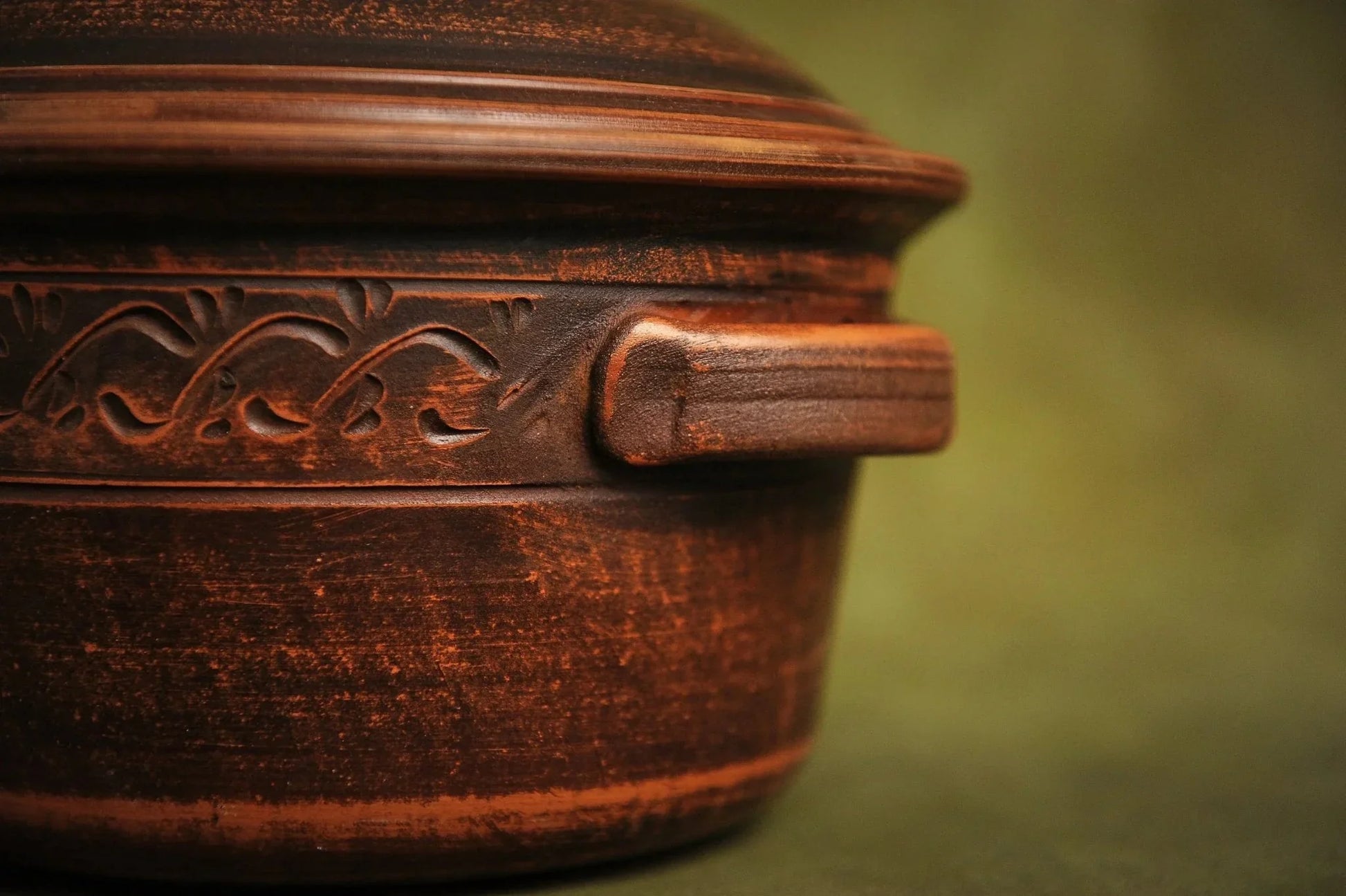 Handmade clay casserole pot with lid and decorative etching, rustic homeware