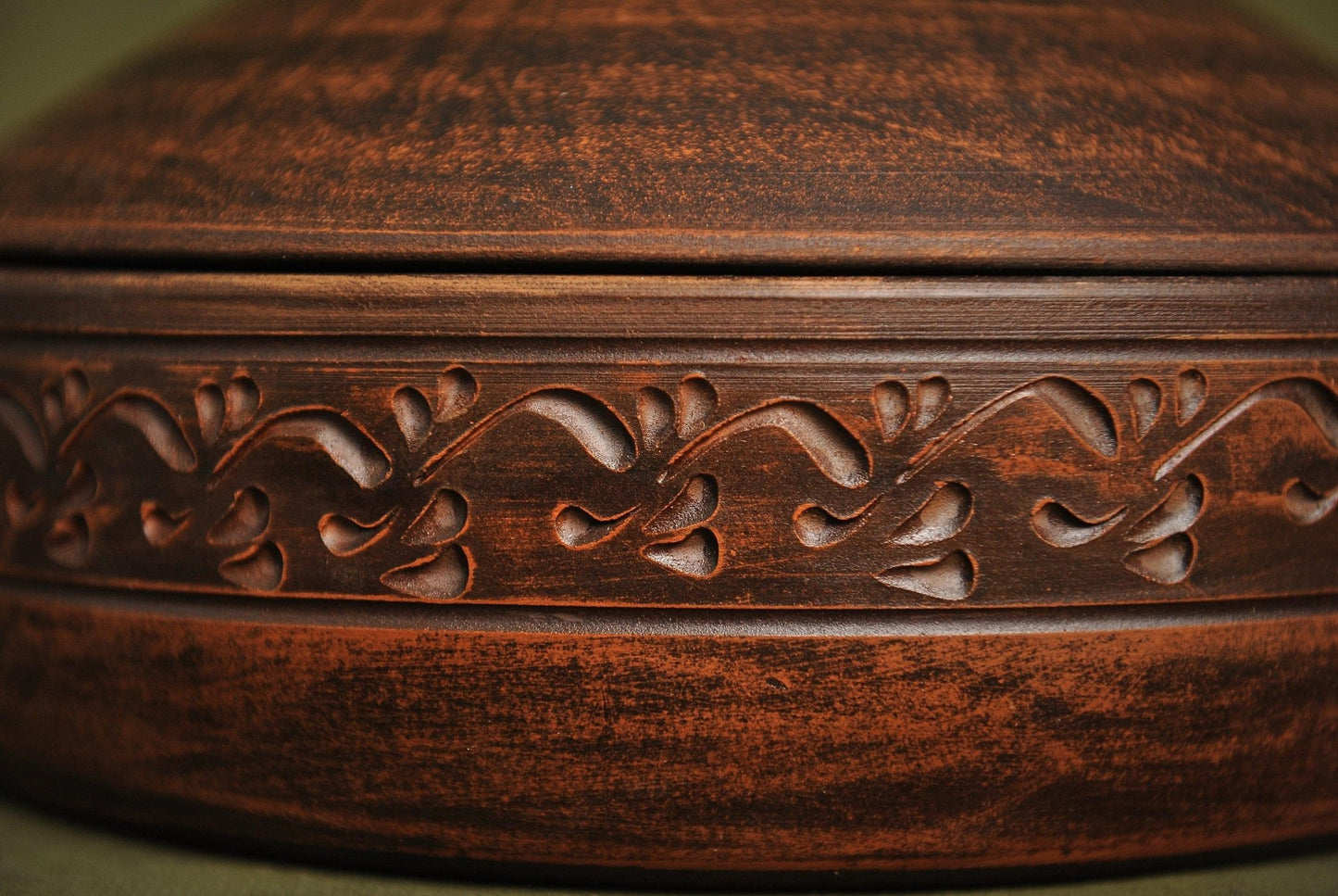 Handmade clay pot with intricate organic carvings, artisan ceramic cookware from clayproductsshop