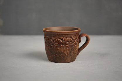 Handmade clay cup with ethnic carved pattern, organic ceramic pottery, clayproductsshop