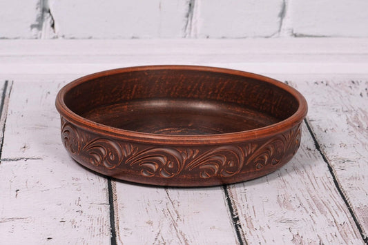 Handmade clay pancake plate with carved pattern, artisan pottery kitchen decor
