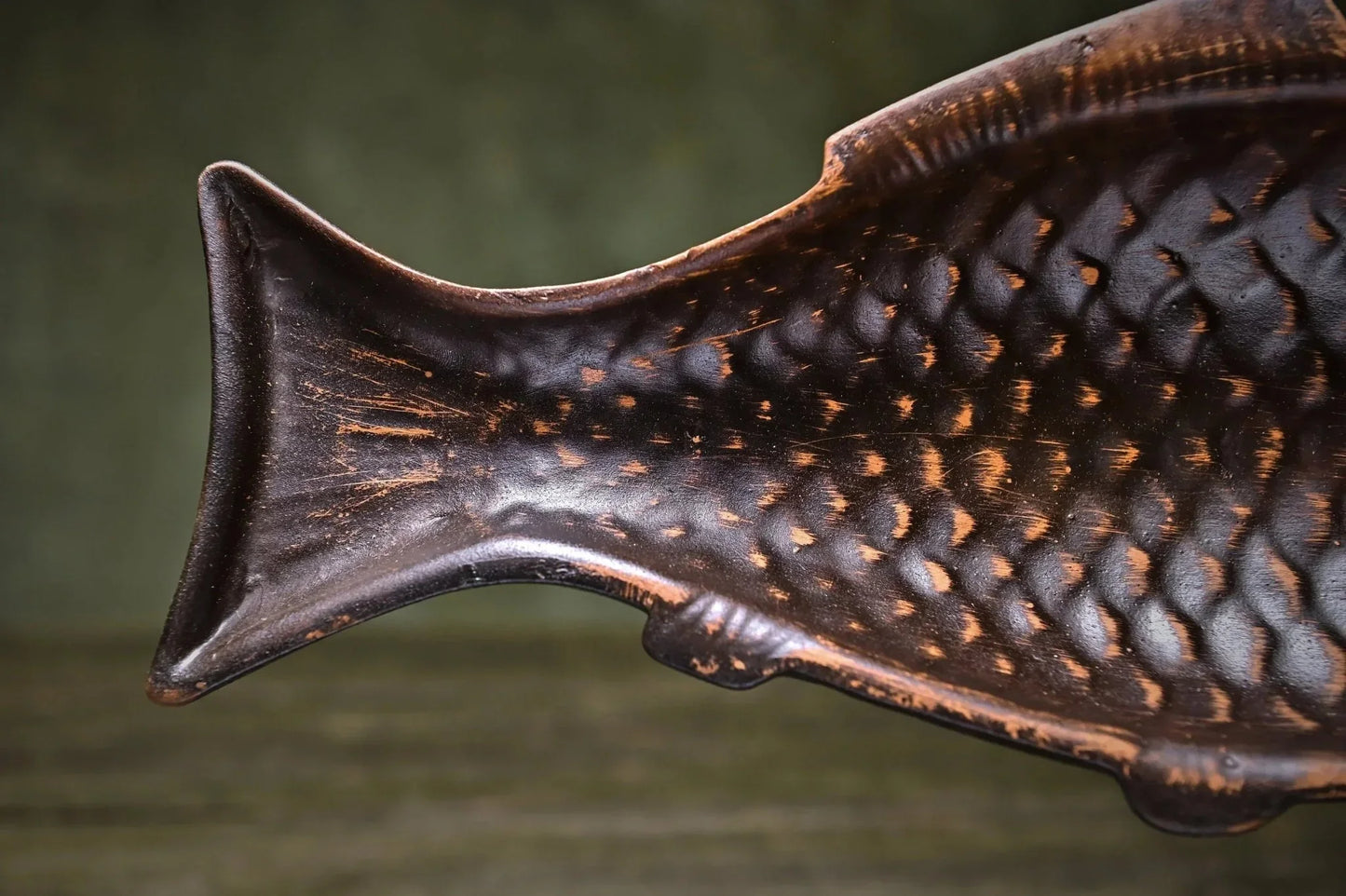 Handmade brown ceramic fish plate with textured scales from clayproductsshop